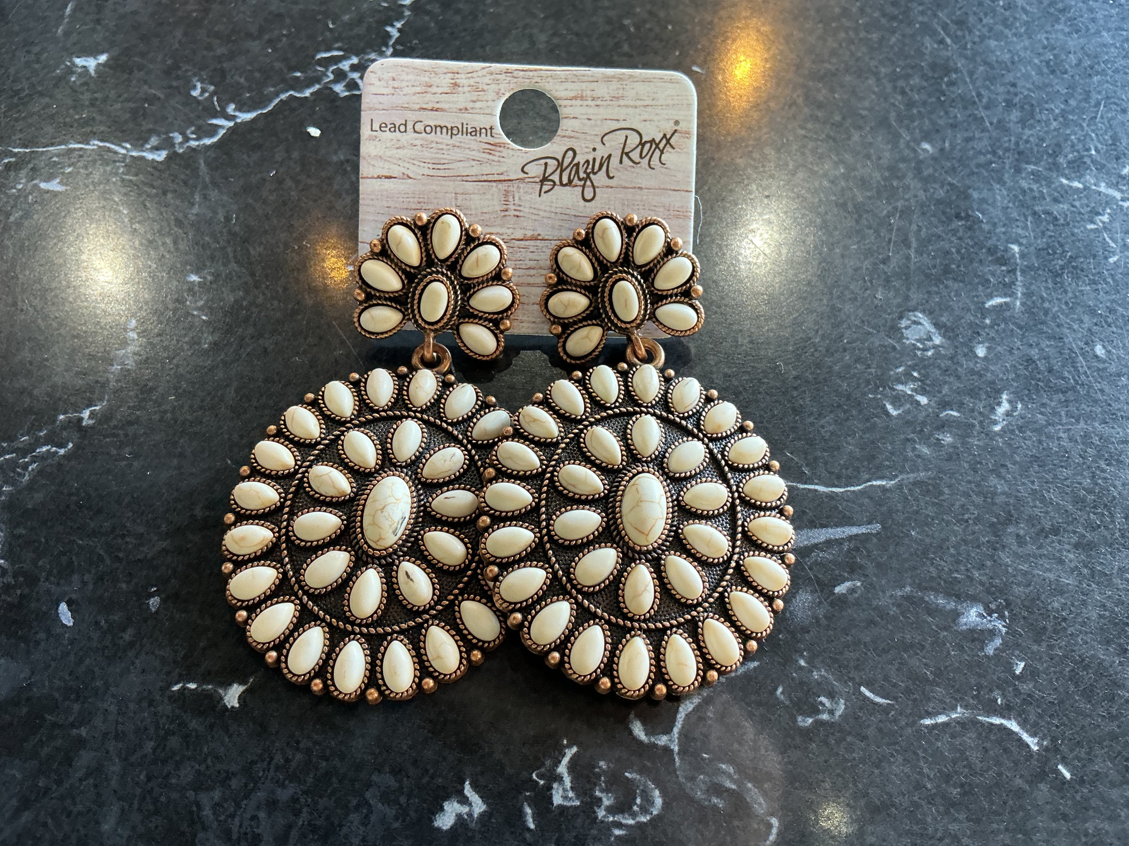 Large white stoned earrings
