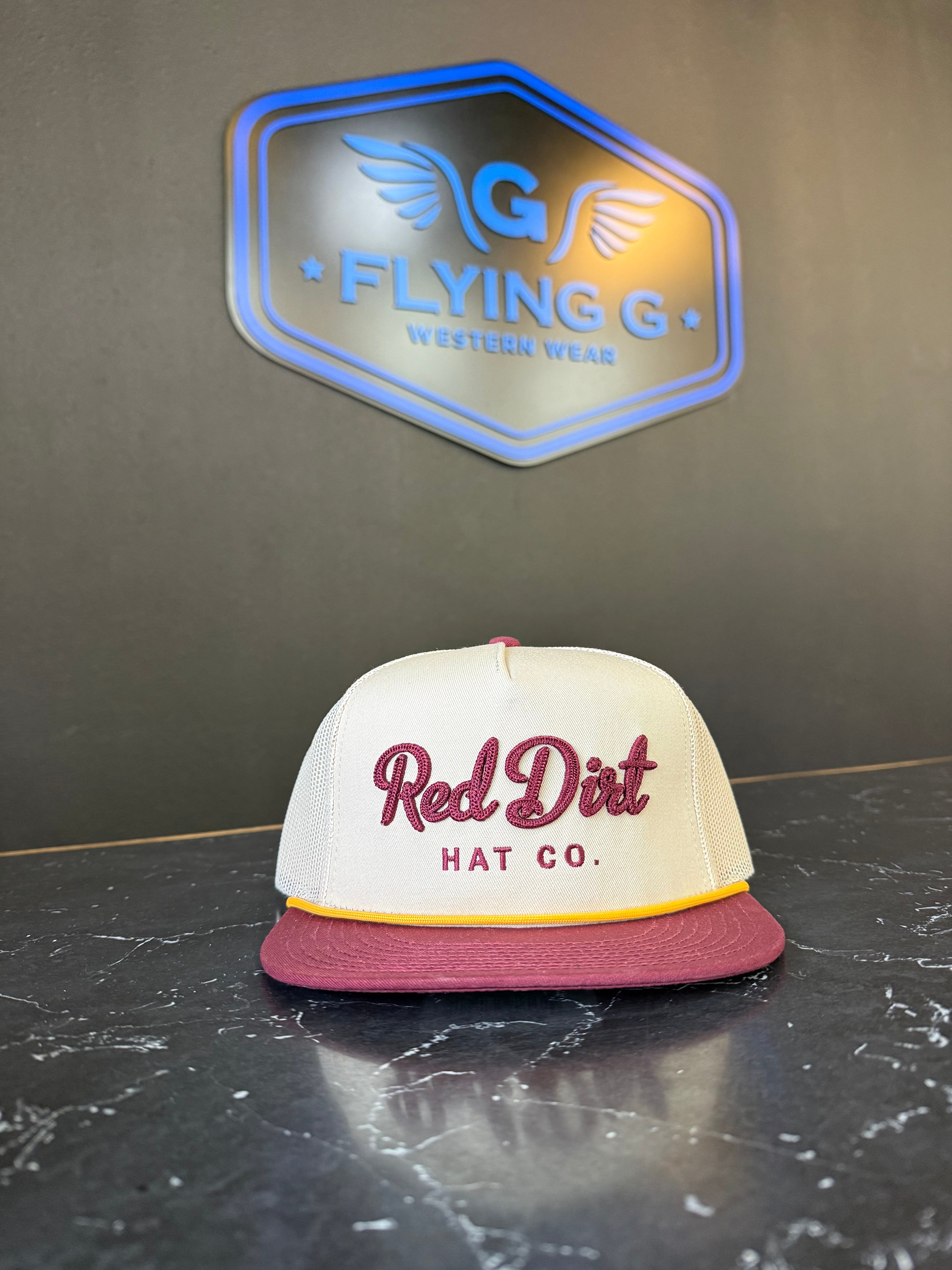 Maroon and tan red dirt hat