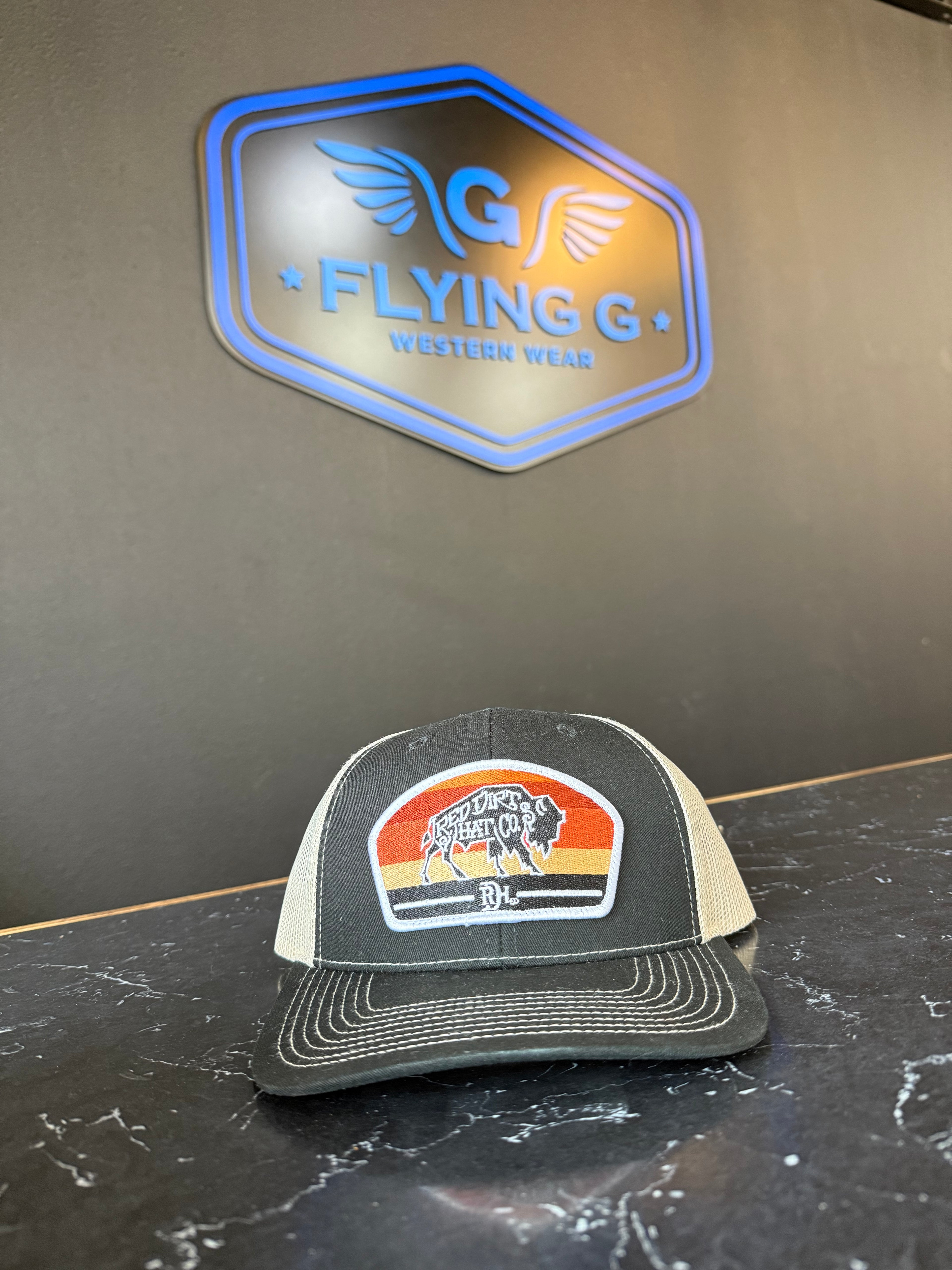 Black and tan buffalo patch red dirt cap