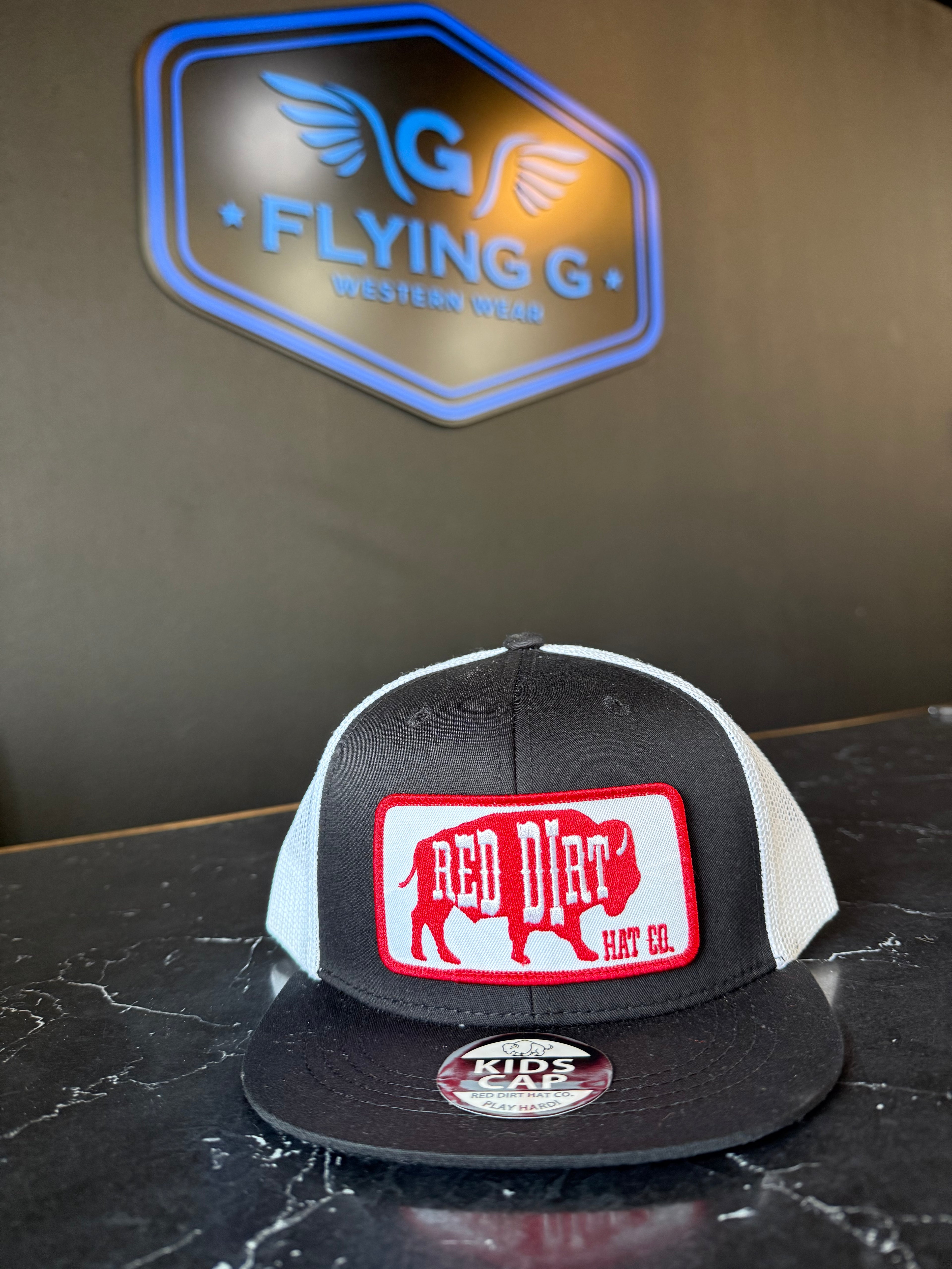 Black and red youth red dirt hat