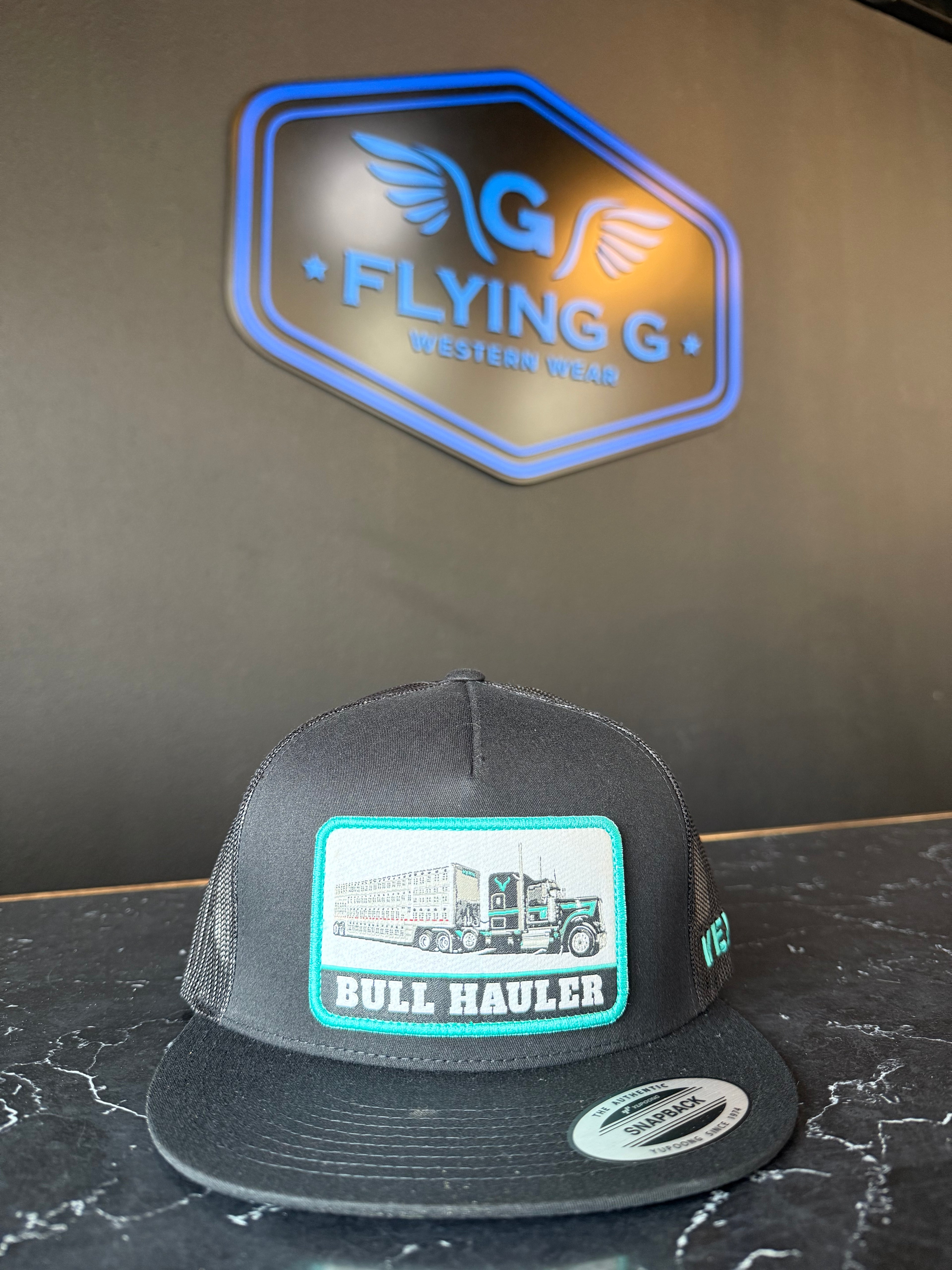 Bull hauler cap