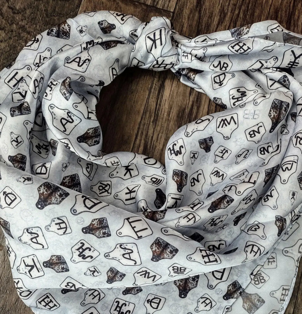 Grey cow tag wild rag