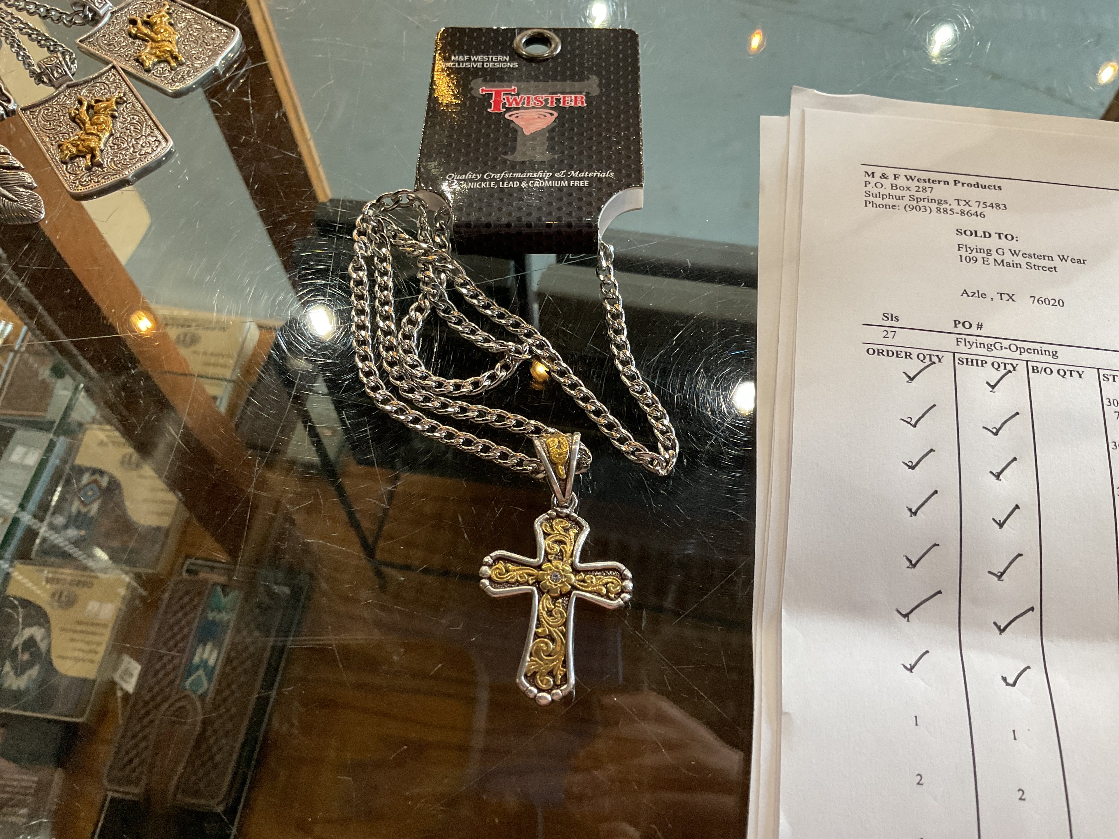 Twister gold and silver cross necklace