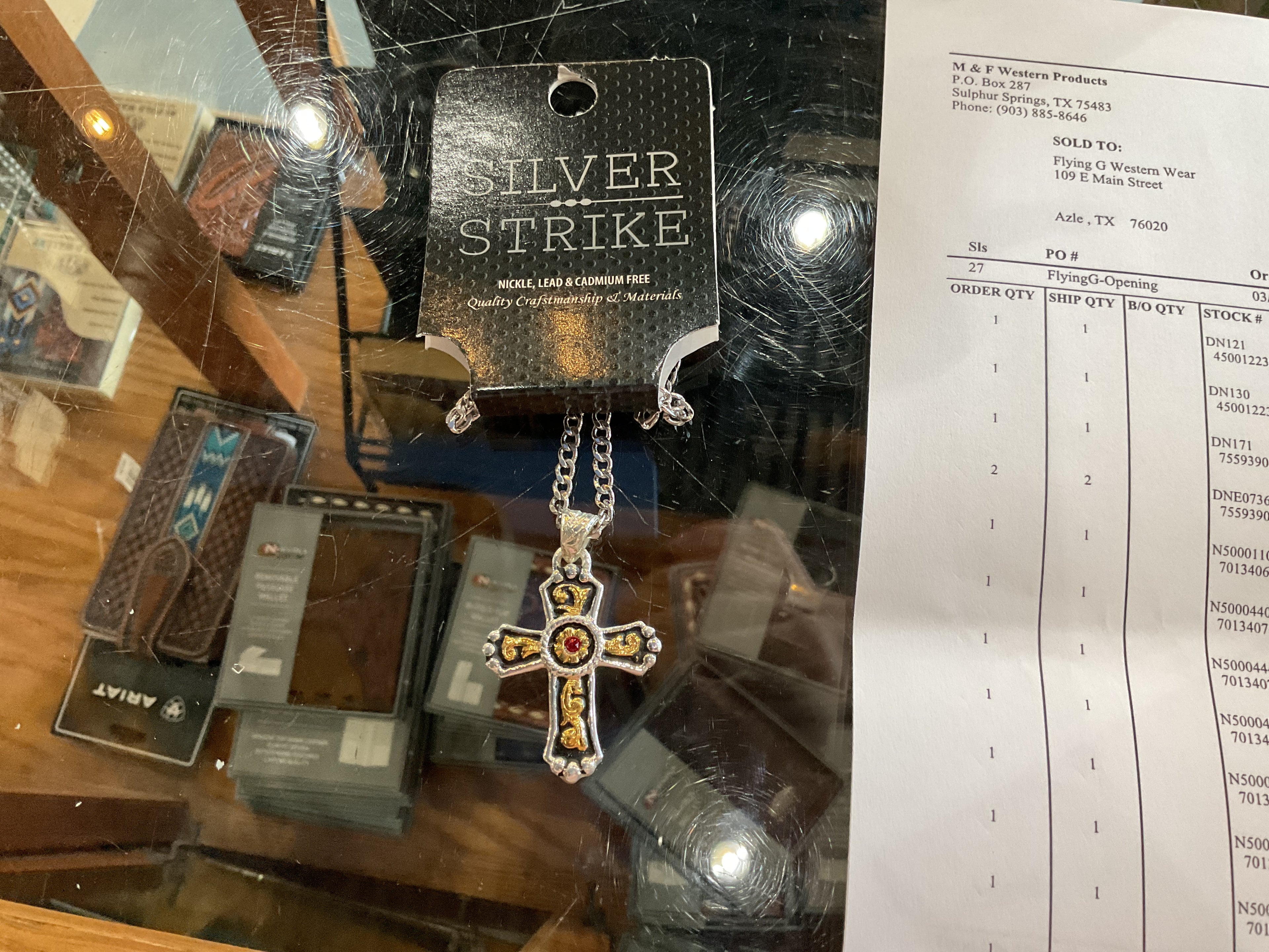 SS gold and silver cross necklace with red center stone