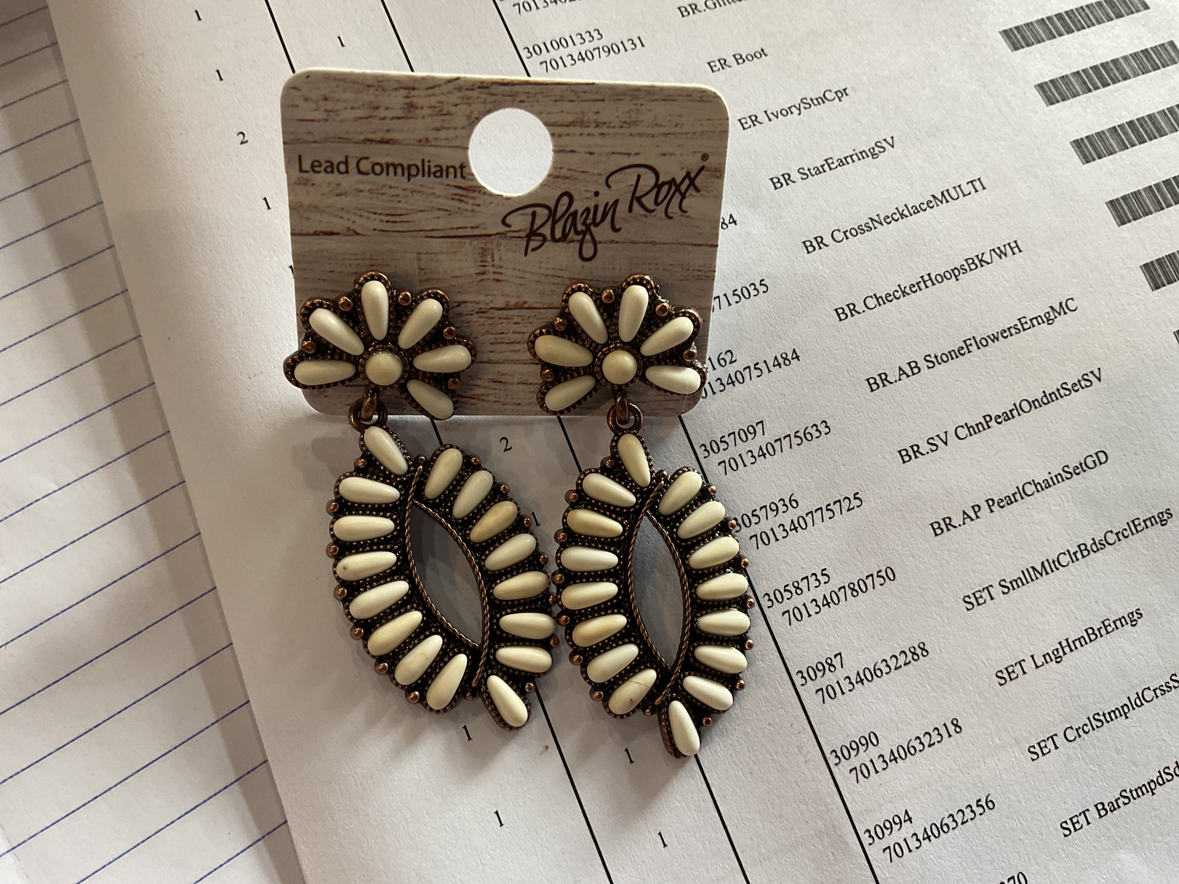 White and copper oval earrings