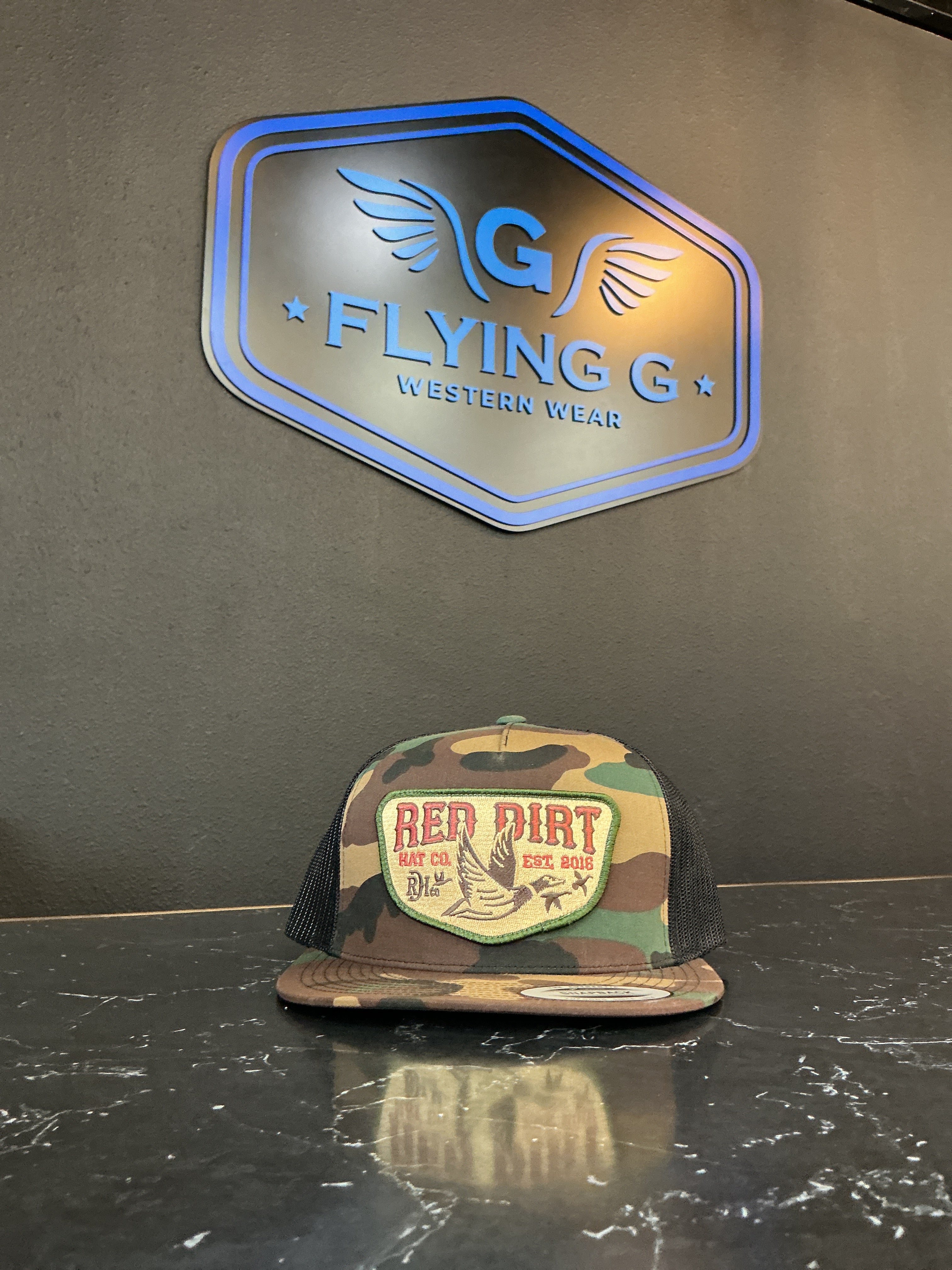 Camo with ducks red dirt cap