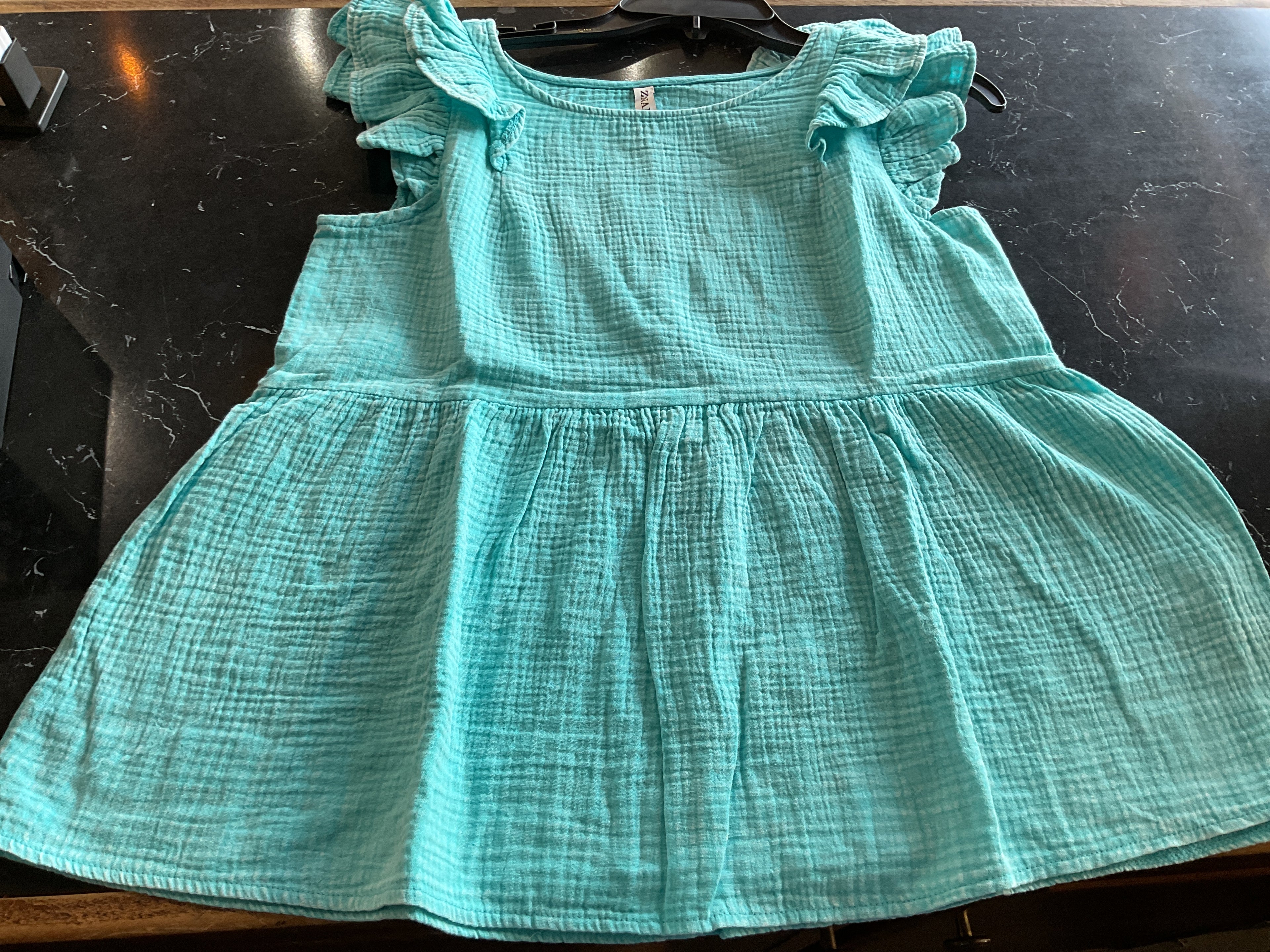Blue ruffle top