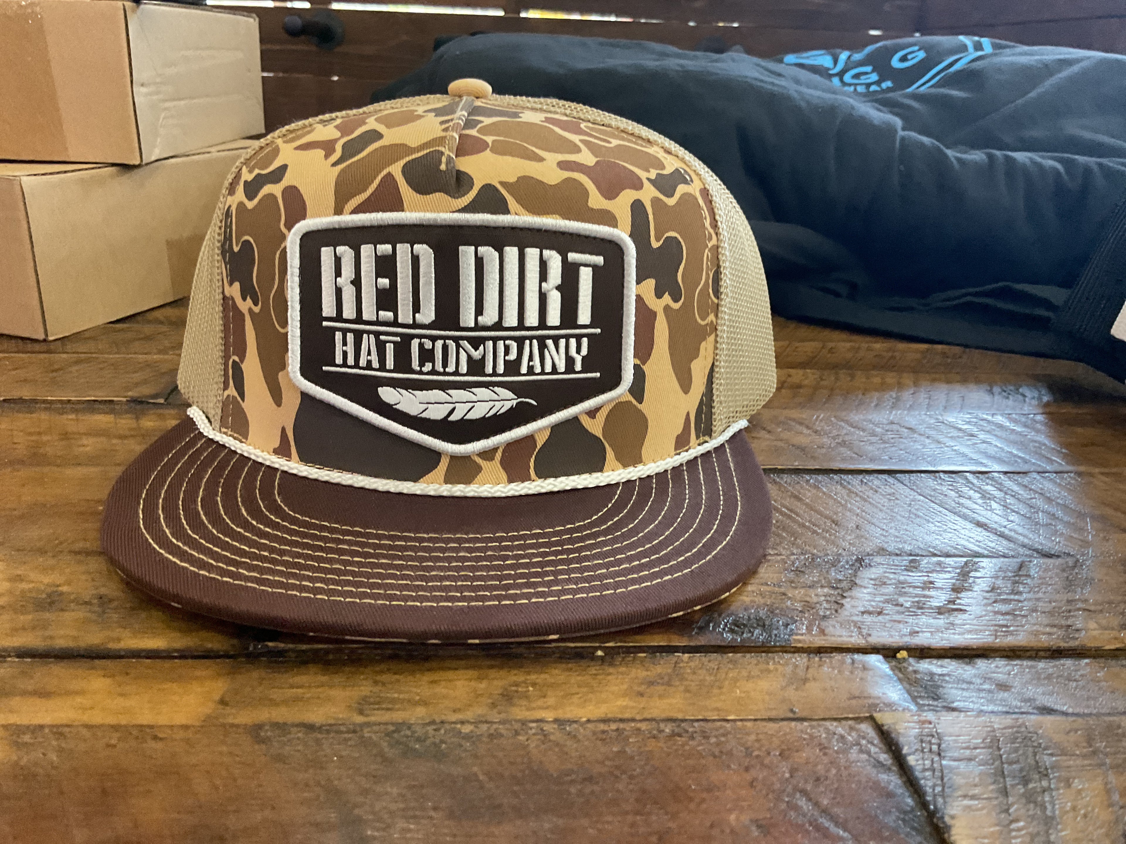 Tan camo red dirt cap