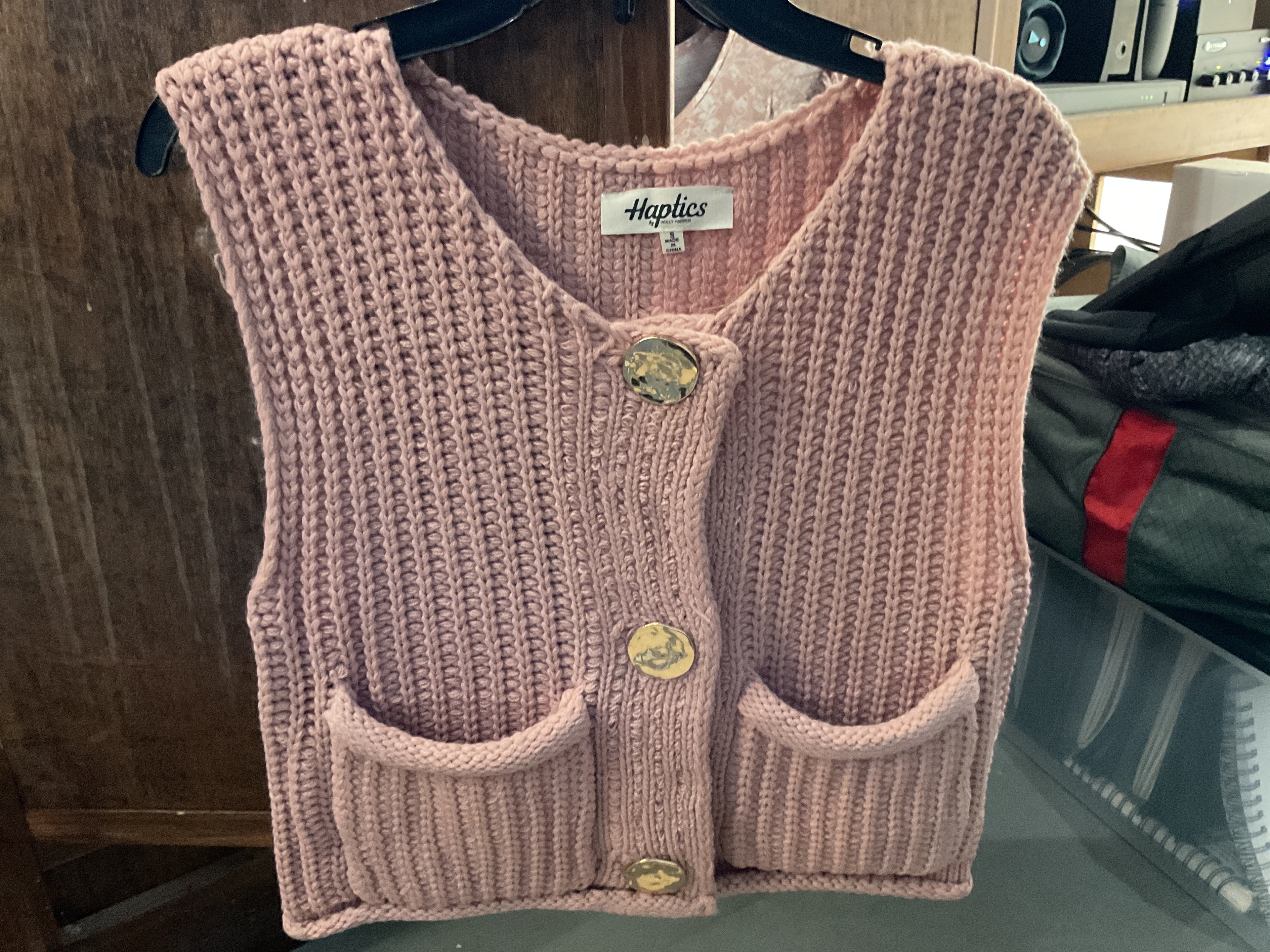 Sweater vest with gold buttons
