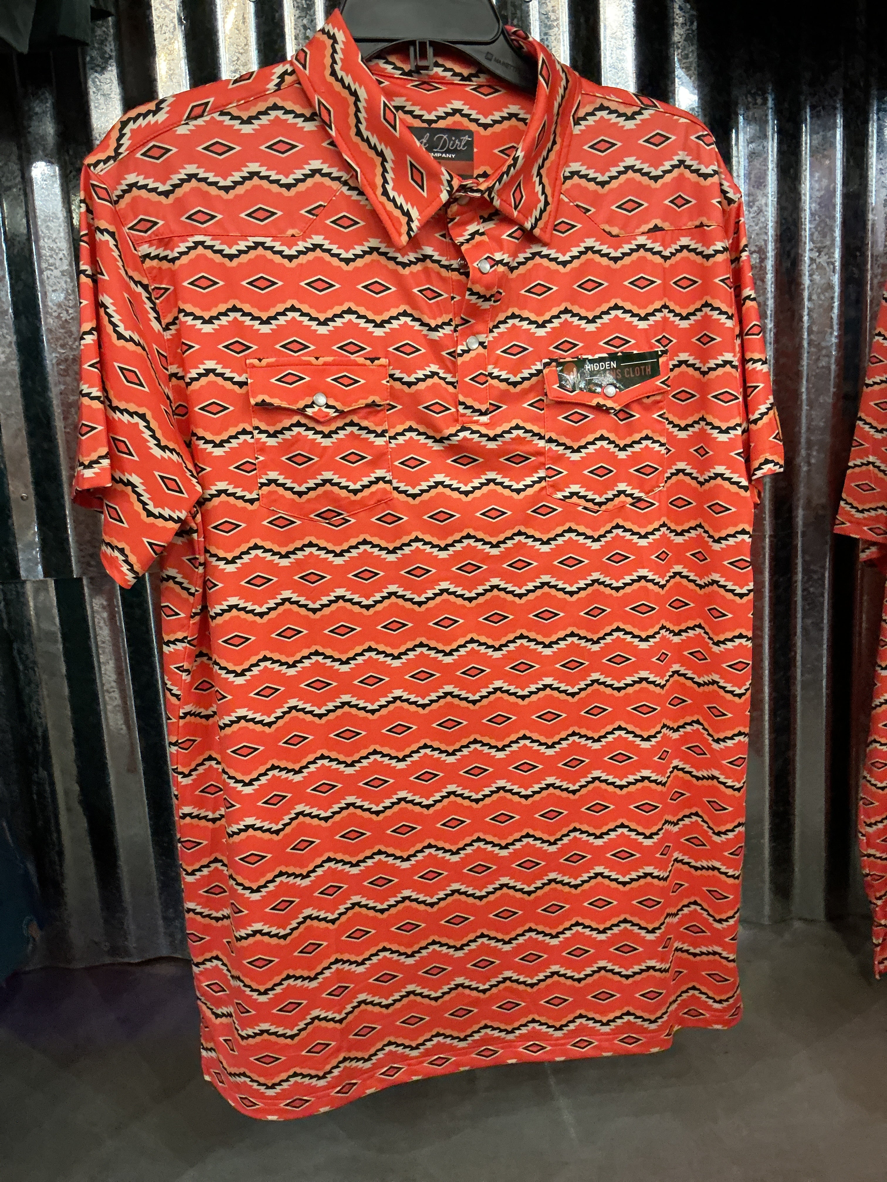 Orange red dirt polo